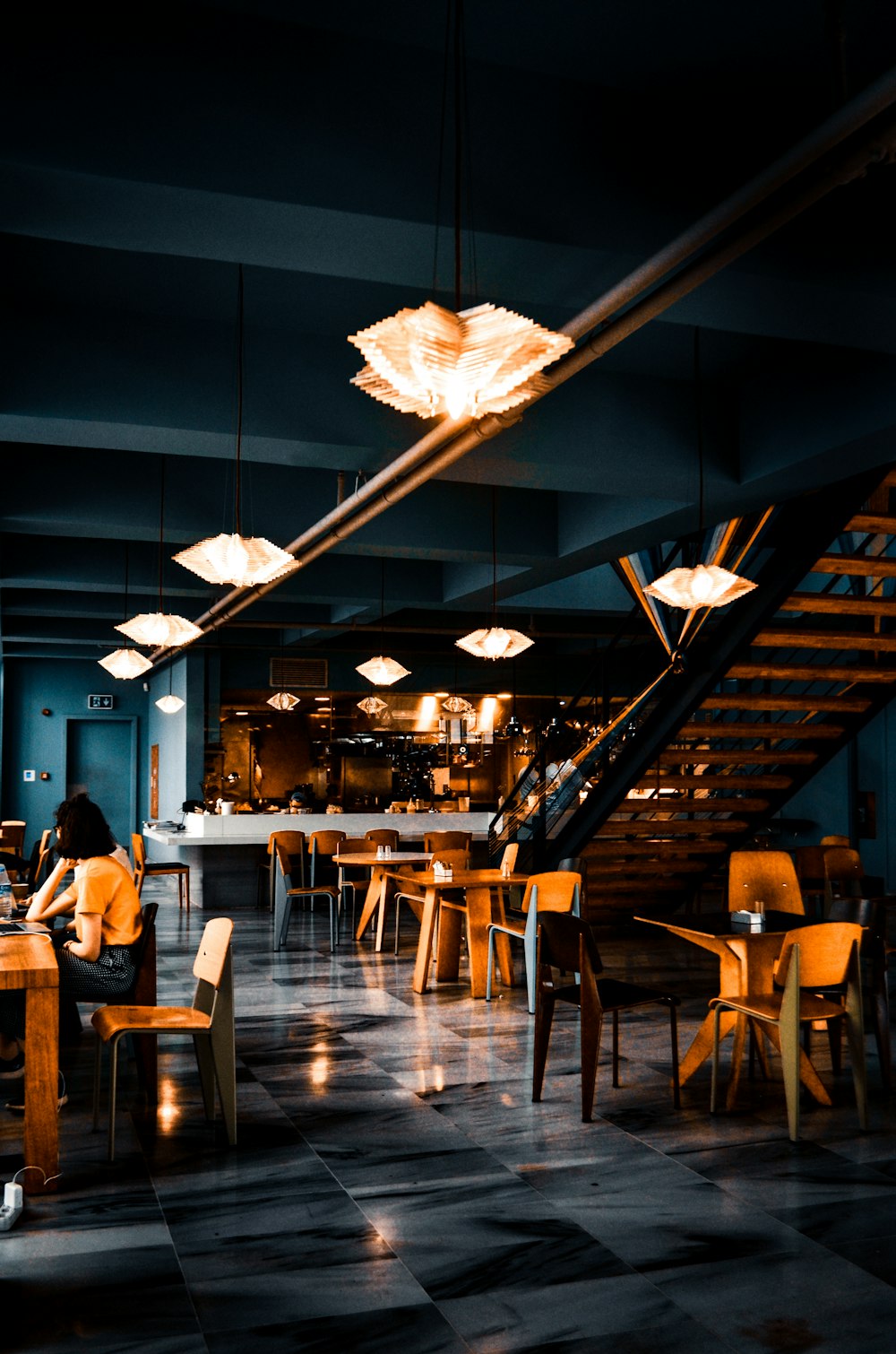 Guests dining inside a busy restaurant