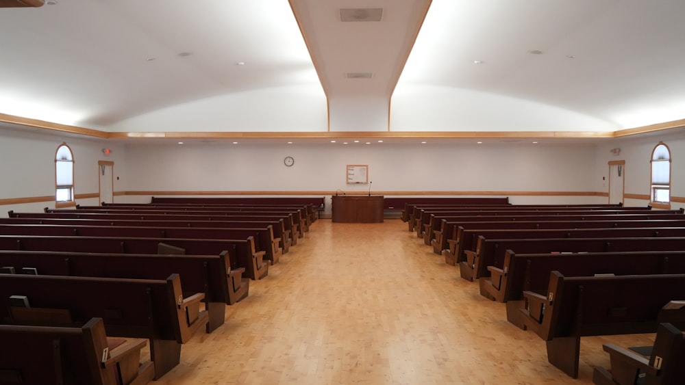 Bright worship hall interior with rows of seating