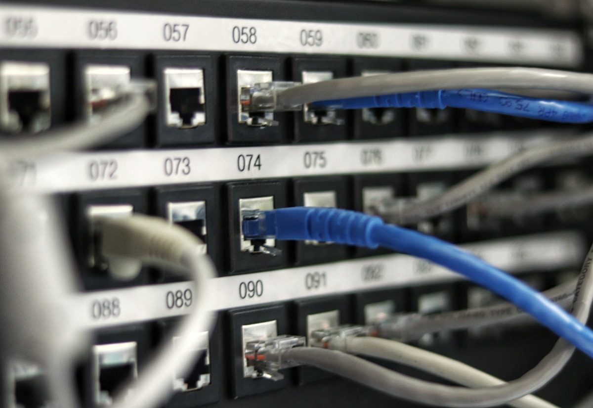 Neatly dressed blue patch cabling in a structured cabling rack